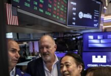 Mercados Futuros dos EUA Enfrentam Queda Antes da Decisão do Federal Reserve em Meio a Conflitos no Oriente Médio