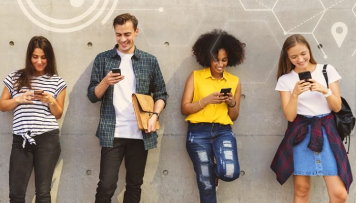 Diverse people using their phones