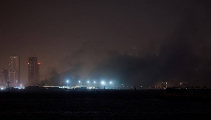 Smoke rises from U.S Navy Base after getting hit by an Iranian strike, in Juffair, Bahrain, March...